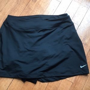 Nike golf skirt with detachable undershorts.